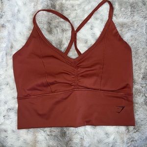 Gym shark bra, orange/ terracotta color, size small